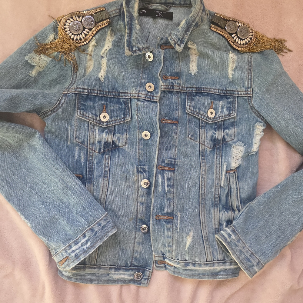 Distressed Blue Denim Jacket with Embellished Shoulders
